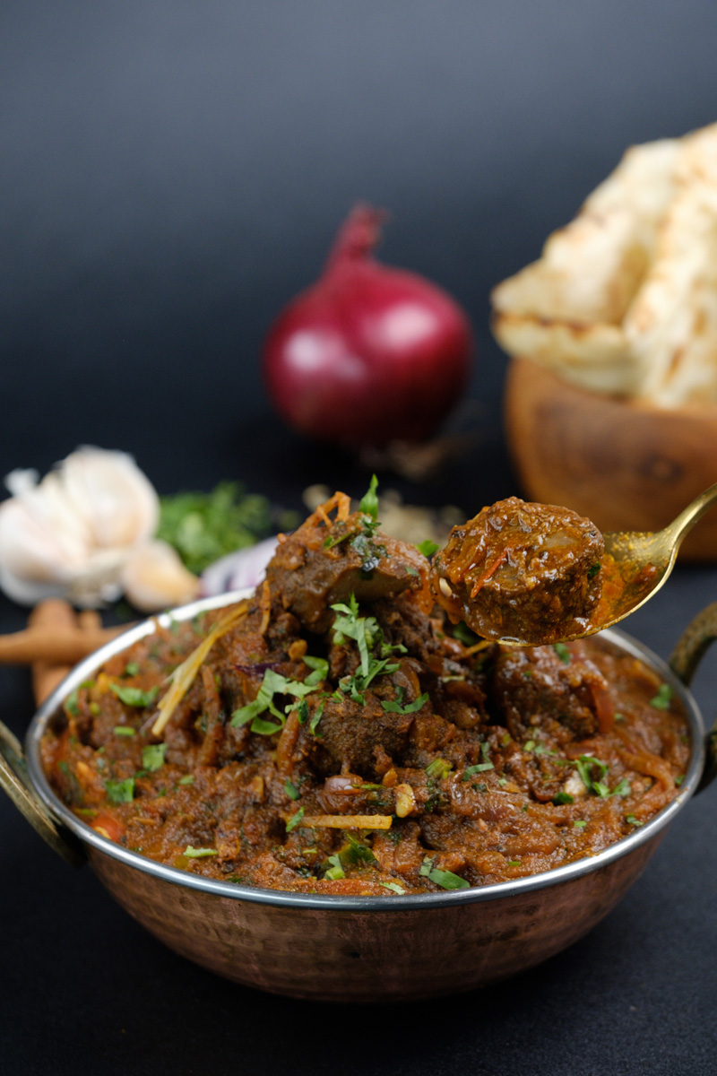 Rogan Josh in a copper bowl at Queen’s of India Kuta Bali